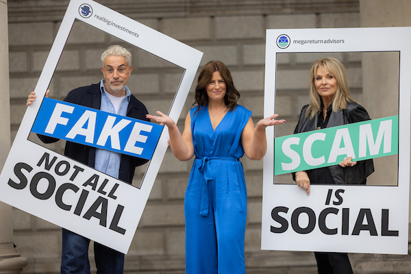 A man and two women holding up two signs with the messaging 'Fake Scam. Not All Social Is Social'