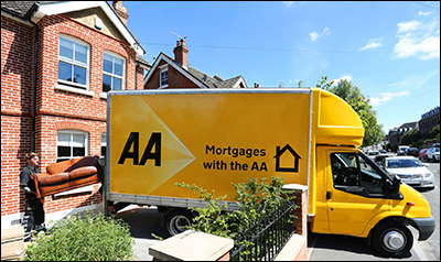 An image of an AA Mortgage moving van parked in a driveway.