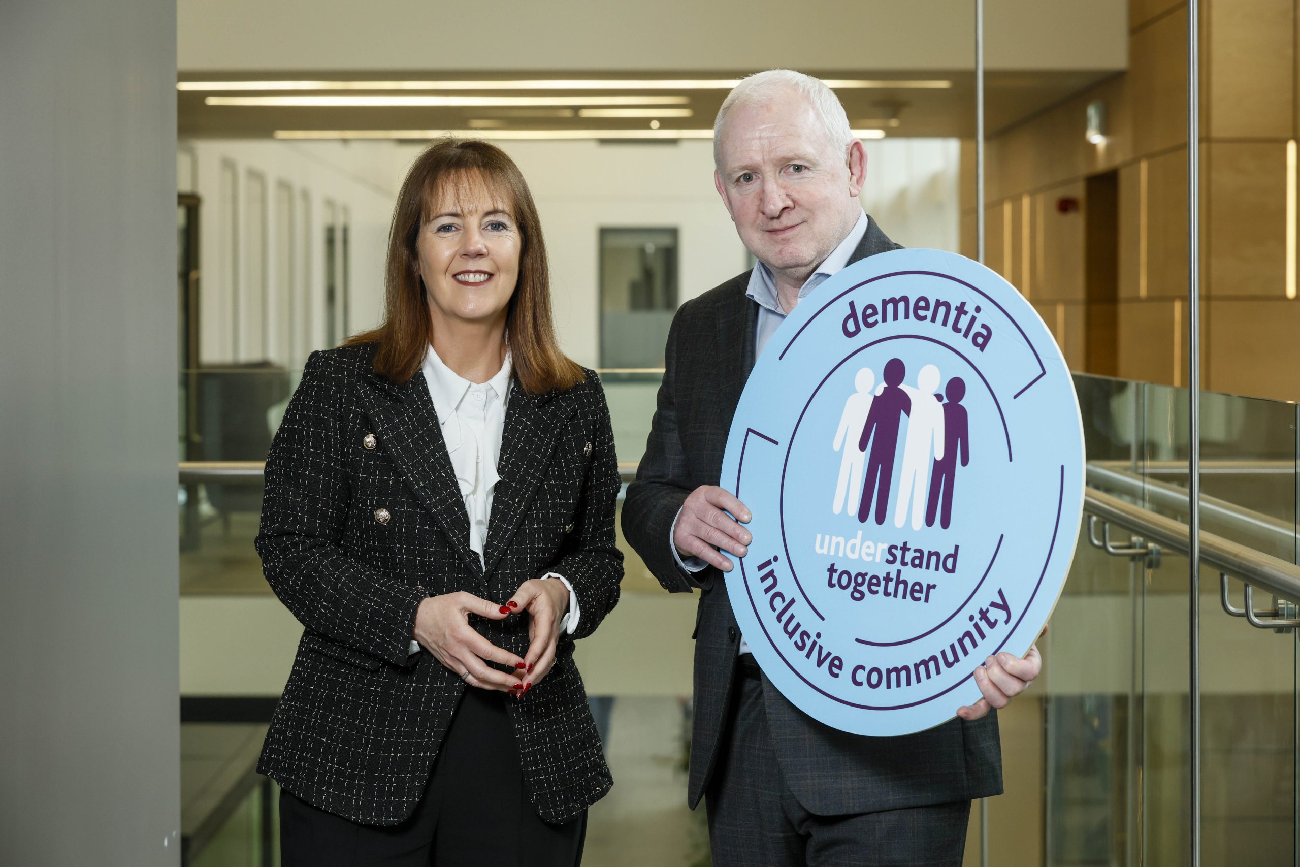 &Aacute;ine McCleary, Group Chief Customer Officer, is pictured with Andy Heffernan, CEO of The Alzheimer Society of Ireland (ASI). Andy Heffernan is holding up a Dementia: Understand Together logo.