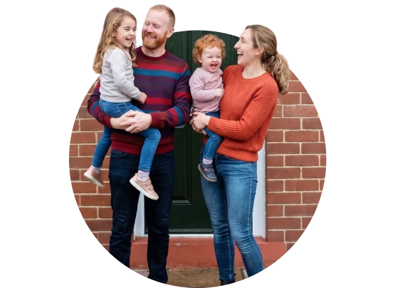 Image of a family with two young children.